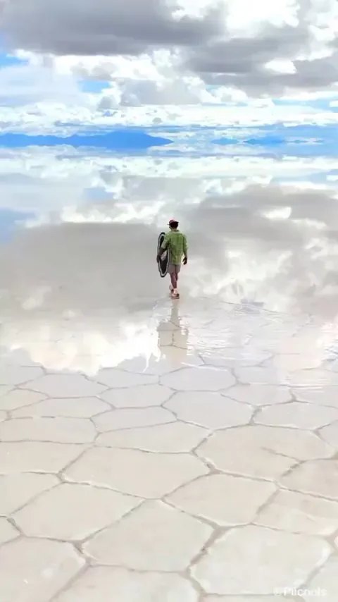Salar de Uyuni in Bolivia is the world's largest salt flat, like a mirror after rain