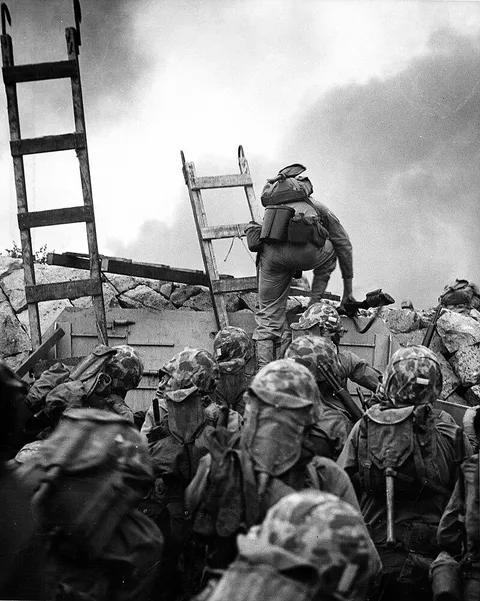 First Lieutenant Baldomero Lopez (US Marine Corps) leads his platoon over the seawall during the Inchon Landings, September 1950. An iconic captured moment of the Korean War, Lopez would die in action just minutes later.