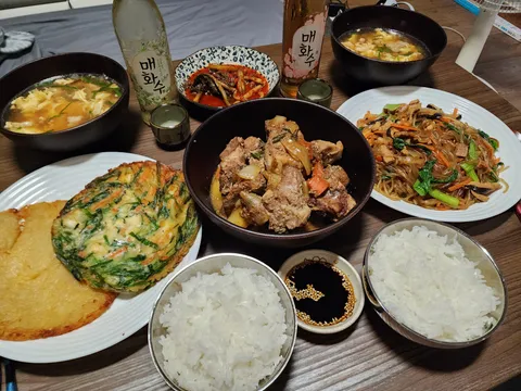 Today is Chuseok in Korea so I made me and my girlfriend Galbi Jjim, Tteokguk, Potato and Chive pancakes, and Japchae