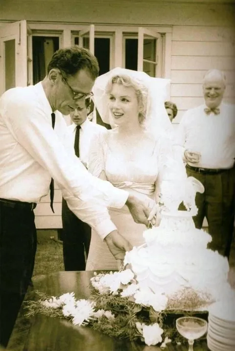 Marilyn Monroe and Arthur Miller on their wedding day, 1956