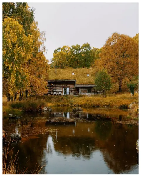 Turf roofed cabin in Struy, the Scottish Highlands.