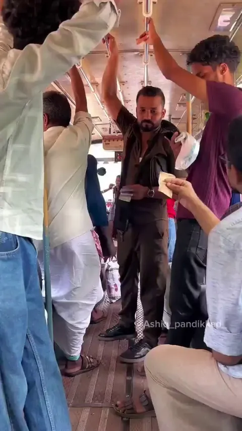 A talented passenger sketches the bus conductor's portrait on the back of a ticket, turning an ordinary ride into an extraordinary moment.