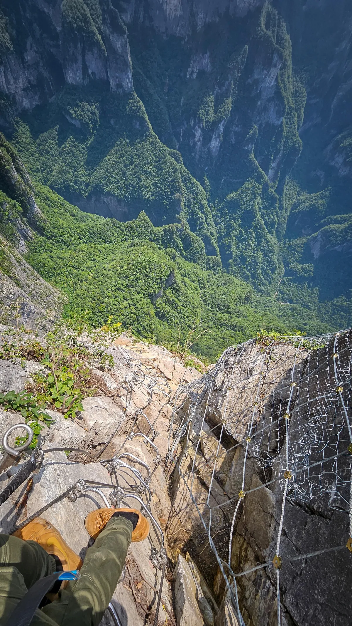 1480 meters big wall Via Ferrata and 168 meters sky ladder climbing challenge in Qixing moutain, Zhangjiajie, China during a solo travel