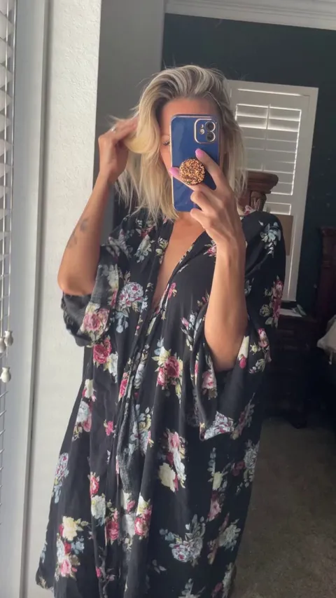 Sneak peak of what’s underneath this mom’s robe. 