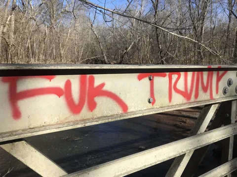 [OC] The message is clear on this pedestrian bridge along a Virginia suburbs trail.
