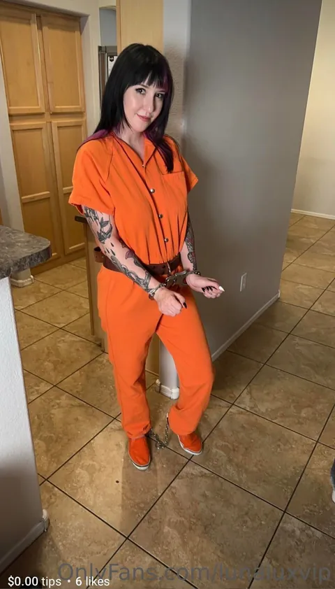 The lovely Luna Lux in cuffs