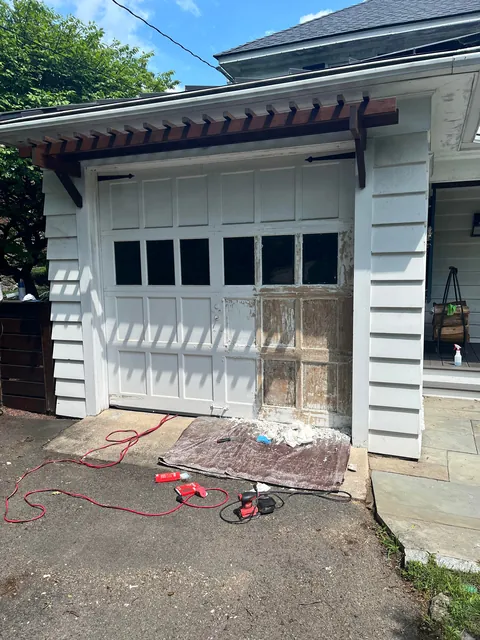 Only took all summer… finally stained my garage door.