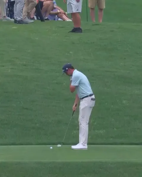 JT Poston found the water off the tee on 17, then hit this shot from the drop zone at the PGA Championship