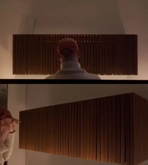 The way this cabinet door opens and closes