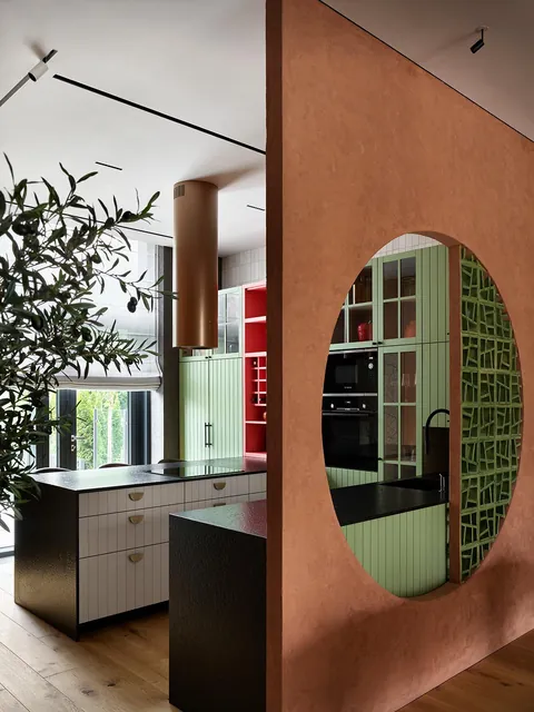 Modern kitchen featuring a circular cutout [1200 x 1600]