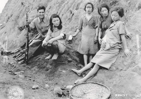 Four Korean comfort women after they were liberated by US-China Allied Forces outside Songshan, Yunnan Province, China on September 7, 1944.