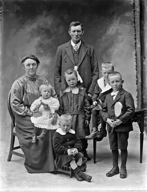 Crisp glass negative of an irish family, 21 of May 1919.