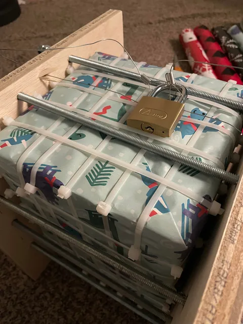 Wrapped this for my daughter this year (Outside to inside layers)