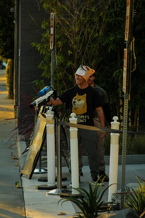 The Tesla Diner in Hollywood threw a Halloween party tonight… so the protesters outside did too [OC]