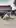 A loyal dog takes a little girl home from school every day
