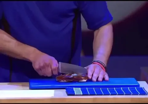 German tv show where contestants try to split things perfectly in half