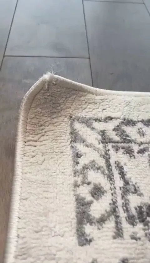 How to fix a curved rug