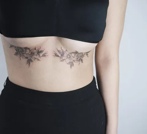 Question: What do you call those chest tattoos that follow under the breast?