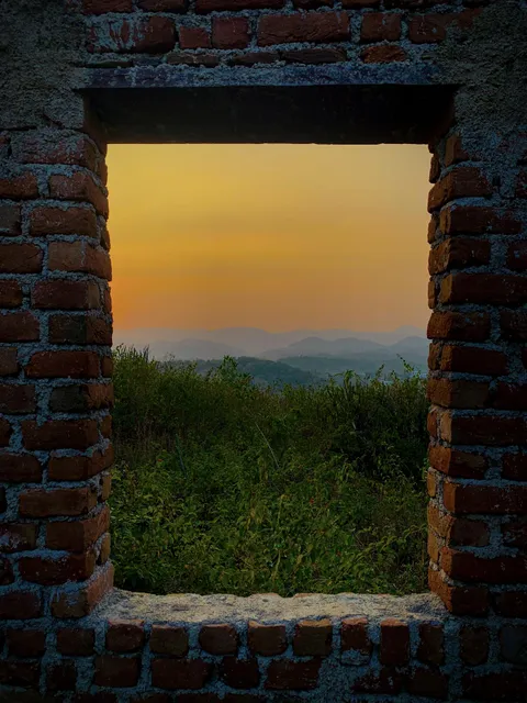 ITAP of the mountains through an under-construction building.