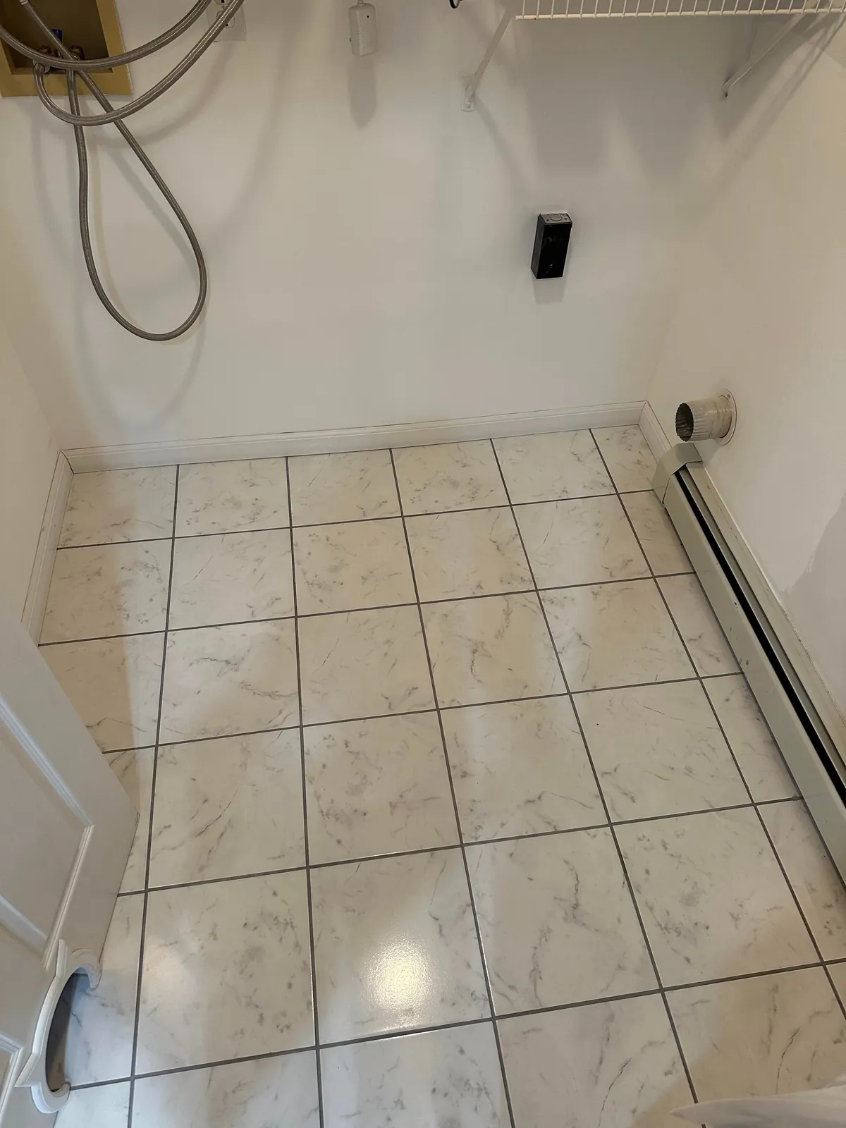 Washer flooded my laundry room so I learned how to tile.