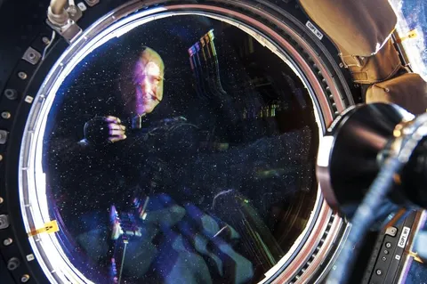 My reflection selfie in a window on the International Space Station! More details in comments.