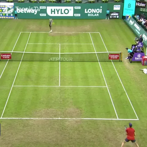 Jannik Sinner with another point of the year contender. He dives and rolls to stay in the point. He follows it up with a backhand passing shot and ends up completely off the court.