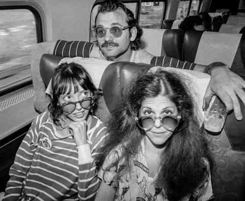 Bill Murray, Shelley Duvall, and Gilda Radner on a train! (circa 1977)