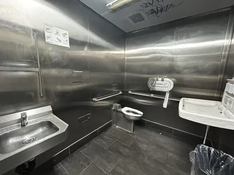 All stainless steel bathroom at the grocery store