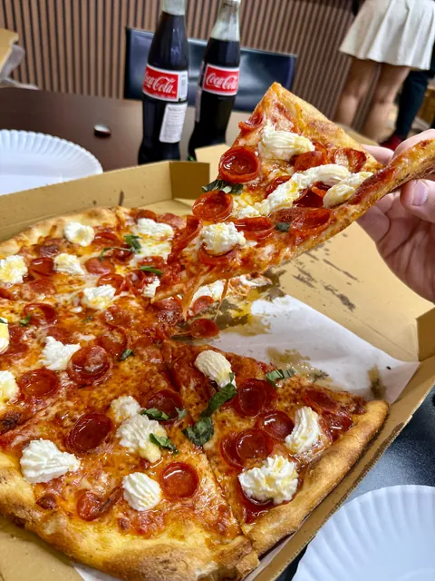 [I ate] Hot Honey Pizza in a Mexican grocery store.