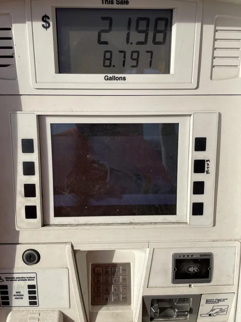Someone wrote “MUTE” next to the button that silences the audio for the advertisements that play while pumping gas