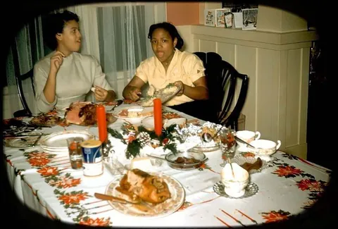 Kodachrome slides from a christmas diner party in the 1950s. It appears the whole family was there