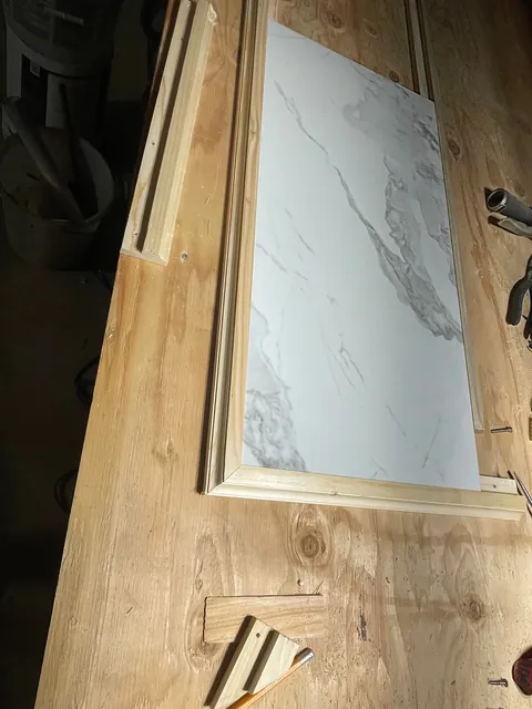 I made my self a night stand table with a tile from lowes and some scrap wood out pallets