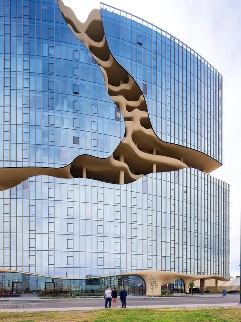 One River North: A Cracked-Open Canyon in the Heart of Denver. By MAD