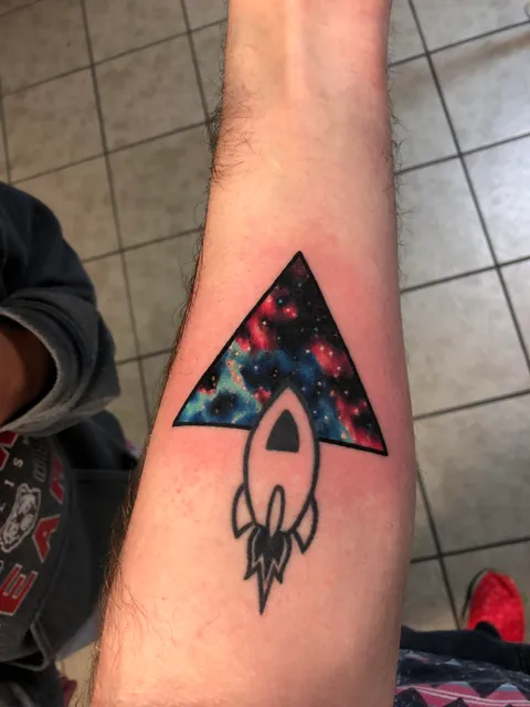 Galaxy window (addition to my rocket ship) by Crystal Scott at Switchblade Tattoo in Forney, Texas
