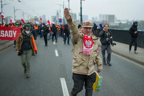 A participant of the march in Warsaw uses Nazi salute to celebrate Polish independence