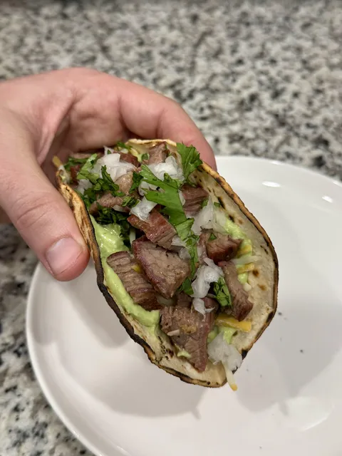 [homemade] charcoal grilled flank steak with jalapeño avocado crema