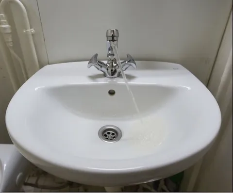 The tilt of the cruise ship makes it look like the water isn't obeying the law of gravity.