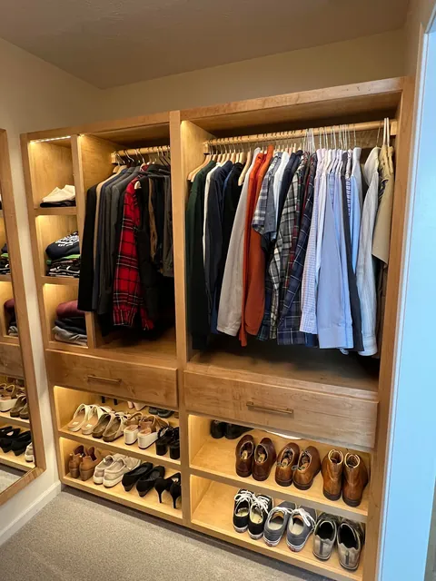 I made custom master closet built-ins with maple and maple plywood, LED lighting