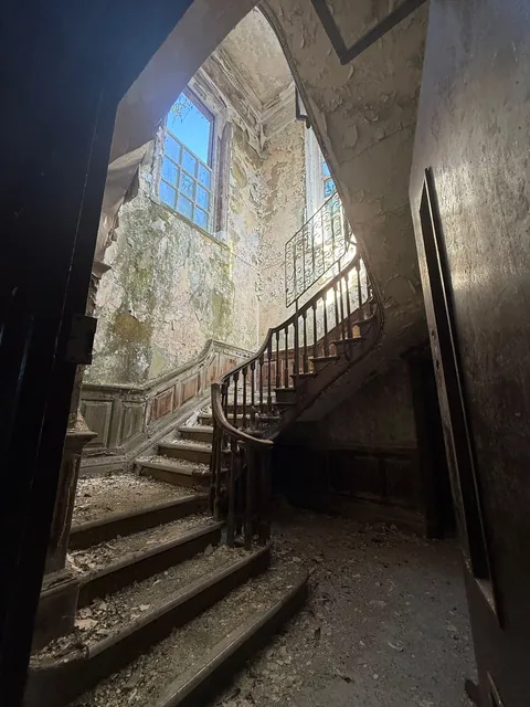 Staircase in abandoned mental asylum.