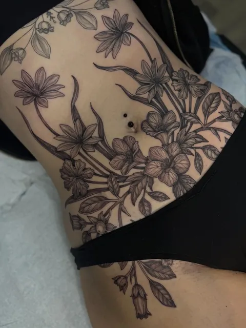 Poisonous Florals on the stomach by me (Amanda Coykendall) at La Rosa Tattoo Company in Fort Collins, Colorado.