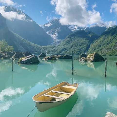 Took this photo on Thursday Traveling in my own country, Mauranger, Norway. The Blu green water comes from a glacier.