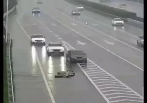 A woman going out of her way to ensure the safety of others