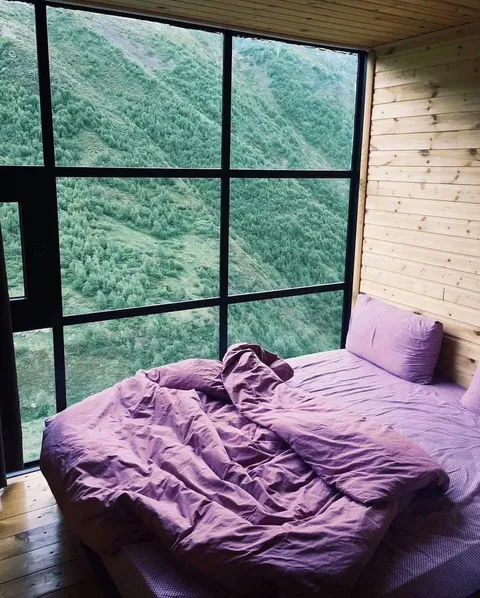 I would wake up in this cozy bedroom.