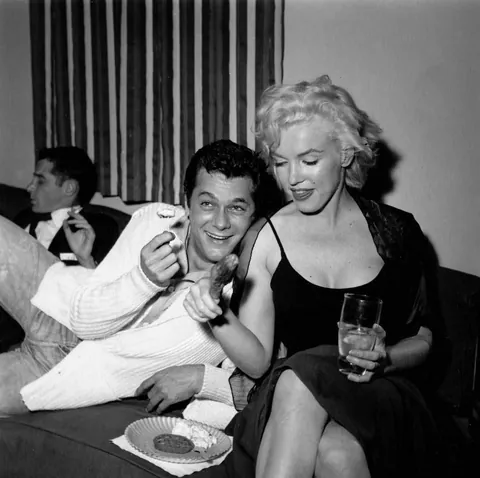 Sammy Davis Jr throws a party (1954). Sammy had just lost his eye in a car accident and had to wear an eyepatch, so others joined in. You may recognize some other famous faces.