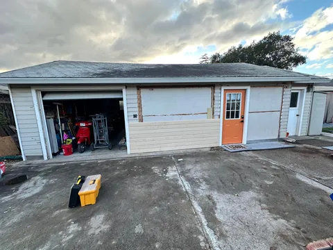 Turned my 1903 three car garage into 1/2 garage and 1/2 bedroom and bathroom my