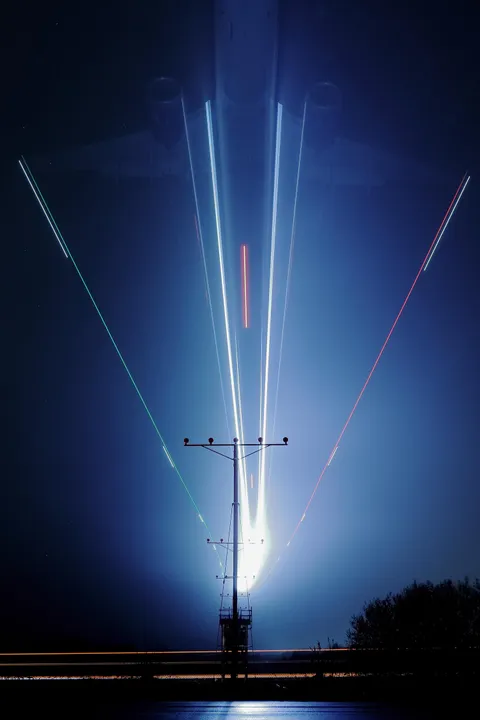 ITAP of an airplane landing in the fog