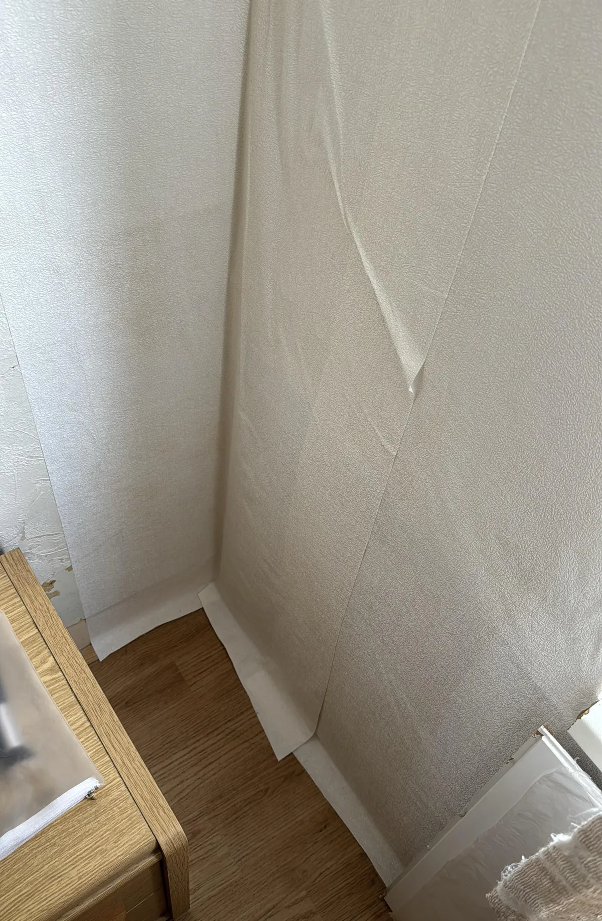 My dad’s sloppy wallpaper job while we were gone