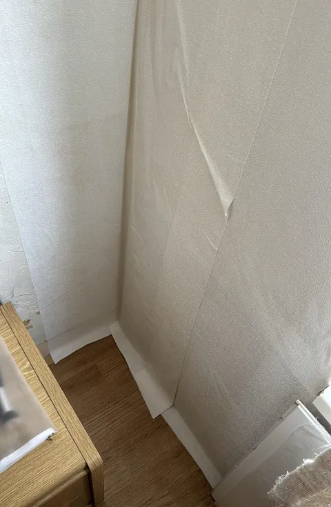 My dad’s sloppy wallpaper job while we were gone