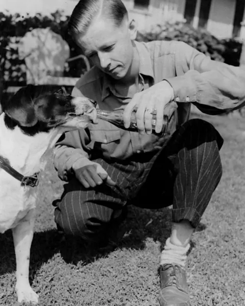 The original SNOOPY and his owner Charles Schulz.