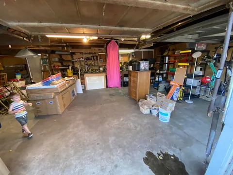 Turned my 1903 three car garage into 1/2 garage and 1/2 bedroom and bathroom my